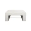 A white, modern coffee table with a glass shelf and side compartments, shown from the front on a white background. Náhled obrázku produktu