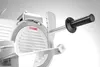 A close-up shot of a commercial food slicer. Náhled obrázku produktu