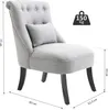 A grey fabric armchair with a small cushion, shown from a side angle with dimensions indicated. Voir les images du produit