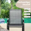 A close-up of a gray outdoor chair with a pool and lush greenery in the background. Text overlays highlight product features. Náhled obrázku produktu