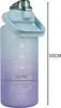 A gradient blue and purple water bottle with time markings and motivational text. Produktbild-Vorschau