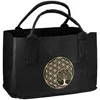 A black felt tote bag with a golden tree of life and flower of life motif. Produktbild-Vorschau