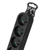 A close-up view of a black power strip with multiple outlets. Produktbild-Vorschau