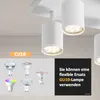 A close-up view of white LED ceiling spotlights with a selection of different GU10 bulbs shown below, and text overlay indicating compatibility. Produktbild-Vorschau