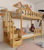 A wooden bunk bed with stairs and storage drawers in a child's room. Podgląd zdjęcia produktu