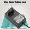A black lithium battery charger is placed on a map. Produktbild-Vorschau