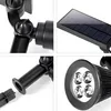 Collage of close-up shots of a black solar-powered LED spotlight, showing its adjustable joints, solar panel, mounting stake, and the light head with four LEDs. Voir les images du produit
