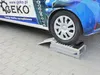 A car tire is on a ramp. Náhled obrázku produktu