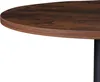 A close-up view of the edge of a round table with a dark wood grain pattern and a black leg. Náhled obrázku produktu