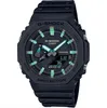 A black Casio G-Shock watch with green accents on a white background. Náhled obrázku produktu