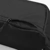 A close-up shot of a black hip pack, focusing on the zipper of a pocket. Náhľad obrázku produktu