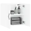 A white wall cabinet with two doors, open to reveal a shelf with toiletries and folded towels. Podgląd zdjęcia produktu