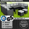 An outdoor seating set with a table and stools on a grassy lawn. Produktbild-Vorschau