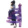 A figurine of the anime character Sasuke Uchiha from Naruto Shippuden, depicted with purple energy effects. Podgląd zdjęcia produktu
