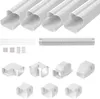 A collection of white PVC ducting components for a mini-split air conditioning system, including straight sections, elbows, and connectors, laid out on a white background. Produktbild-Vorschau