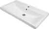 A white ceramic sink with a drain and faucet hole, shown from a slightly elevated angle against a white background. Produktbild-Vorschau