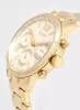 Close-up of a gold Guess watch. Podgląd zdjęcia produktu