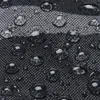 A close-up of a black fabric surface with water droplets. Náhled obrázku produktu