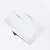 A swatch of white cream on a white background. Náhled obrázku produktu