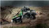 A LEGO Technic 4x4 Mercedes-Benz Zetros Offroad-Truck driving over rocky terrain. Podgląd zdjęcia produktu