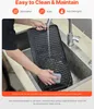A person is washing a grill plate in a sink. Náhľad obrázku produktu