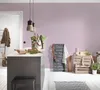A kitchen island with decorative items and a chalkboard menu. Produktbild-Vorschau