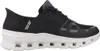 A side view of a black Skechers slip-on shoe with a white sole. Voir les images du produit