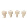 Four wooden furniture legs with ornate carvings are displayed against a white background. Podgląd zdjęcia produktu