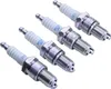 Four spark plugs arranged diagonally on a white background. Náhled obrázku produktu