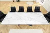 A dining table with chairs in a modern room. Produktbild-Vorschau