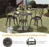 A bistro set with two chairs and a table is set up on a lawn, with an umbrella in the table. Náhľad obrázku produktu