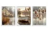 A triptych of framed posters depicting a serene lake scene with reeds and a boat at sunset. Produktbild-Vorschau
