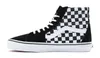 A side view of a black and white checkerboard Vans Sk8-Hi sneaker against a white background. Podgląd zdjęcia produktu