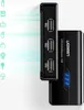 A black UGREEN USB 3.0 Multifunction Hub with three USB-A ports is shown connected to a larger black device. Icons representing various peripherals are displayed on the left side of the image, connected by green lines to the hub, suggesting connectivity. Voir les images du produit