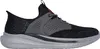 A side view of a black and gray Skechers men's shoe against a white background. Produktbild-Vorschau