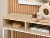 A close-up view of a console table with decorative items on top and inside the shelves. Náhled obrázku produktu