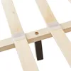 A close-up view of the wooden slats and support structure of a bed frame. Náhľad obrázku produktu