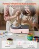 A person and a child are using a pink pottery wheel, with art supplies and decorated pots in the foreground. Produktbild-Vorschau