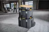 A construction worker stands in the background while a stack of DeWALT toolboxes sits in the foreground. Anteprima dell’immagine prodotto