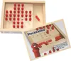A wooden board game with red pegs and a card showing the game. Podgląd zdjęcia produktu
