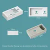 Diagrams and measurements of a white rectangular sink against a teal background. Anteprima dell’immagine prodotto