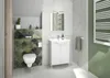 A modern bathroom with a toilet, vanity, and mirror. Anteprima dell’immagine prodotto