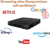 A black streaming box is shown with various streaming service logos and text indicating certification. Produktbild-Vorschau