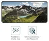 A smartphone screen displaying a mountain landscape, with icons and text below describing product features. Náhľad obrázku produktu