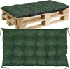 A green tufted cushion placed on a wooden pallet. Anteprima dell’immagine prodotto