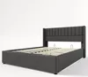 A studio shot of a gray upholstered bed frame with a slatted mattress base, against a white background. Produktbild-Vorschau