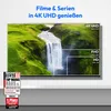 A television screen displaying a waterfall scene with resolution comparisons, accompanied by award badges. Produktbild-Vorschau