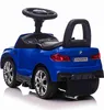 A blue toy car with a steering wheel and a backrest, shown from a rear-diagonal angle on a white background. Produktbild-Vorschau