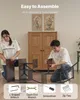 Two people assembling a shelf unit, with tools and accessories shown at the bottom. Produktbild-Vorschau