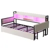 A white and black metal daybed with pink LED lighting and storage drawers. Produktbild-Vorschau
